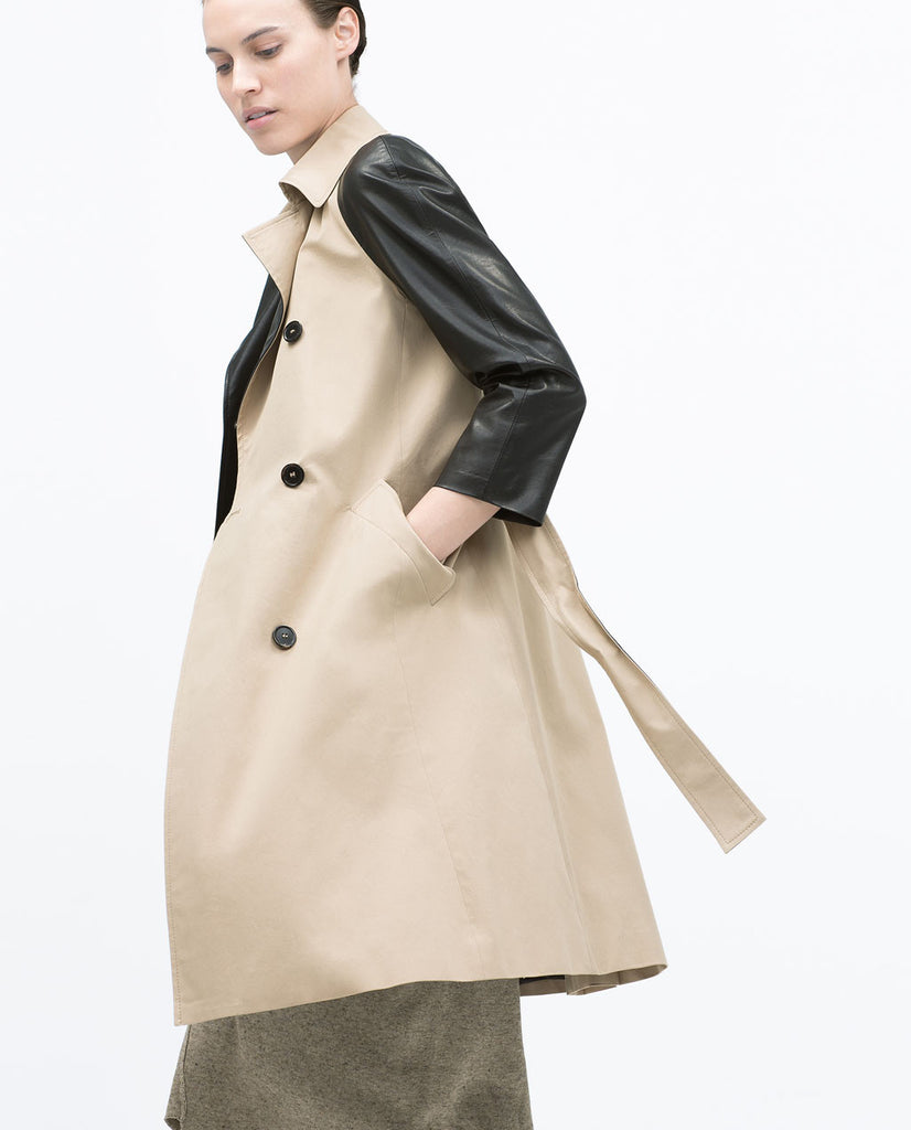 Raincoat with contrast sleeve